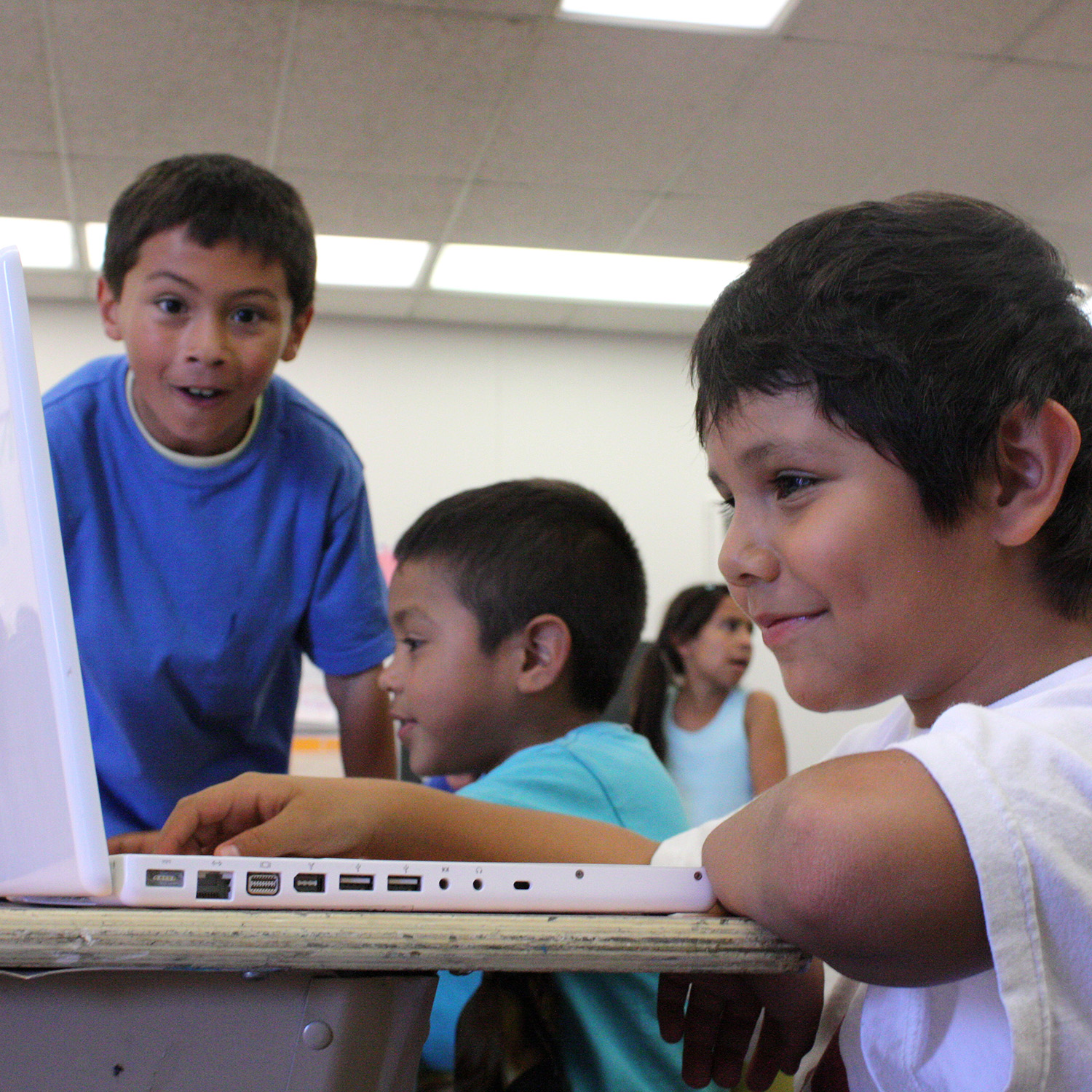 Children in a classroom enjoy working on laptops at Boys & Girls Clubs of Garden Grove, CA