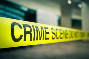 crime scene tape in front of a business