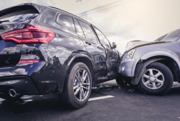 two damaged vehicles that have collided