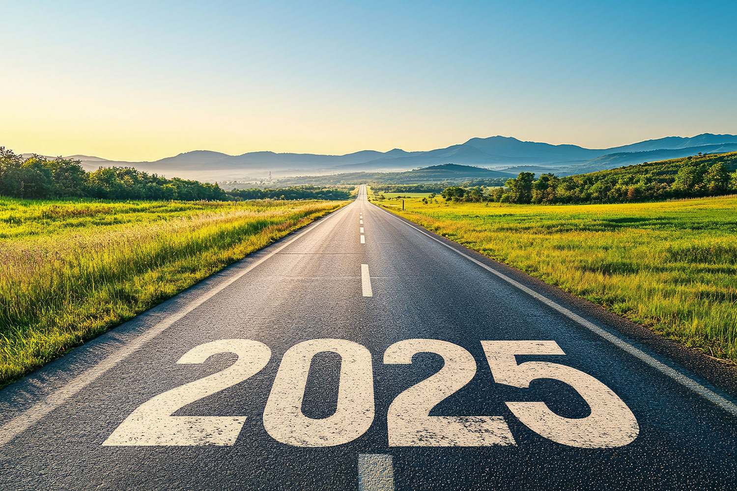 road stretching to horizon with 2025 painted on it