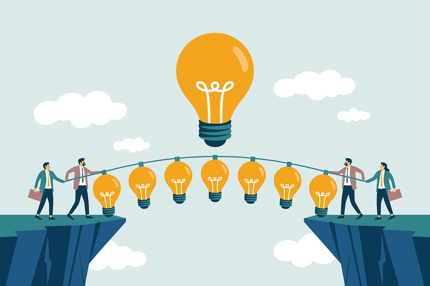 people hanging on a rope with light bulbs on a cliff