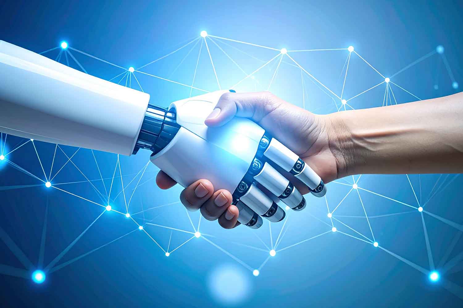 a robot hand shaking a human hand