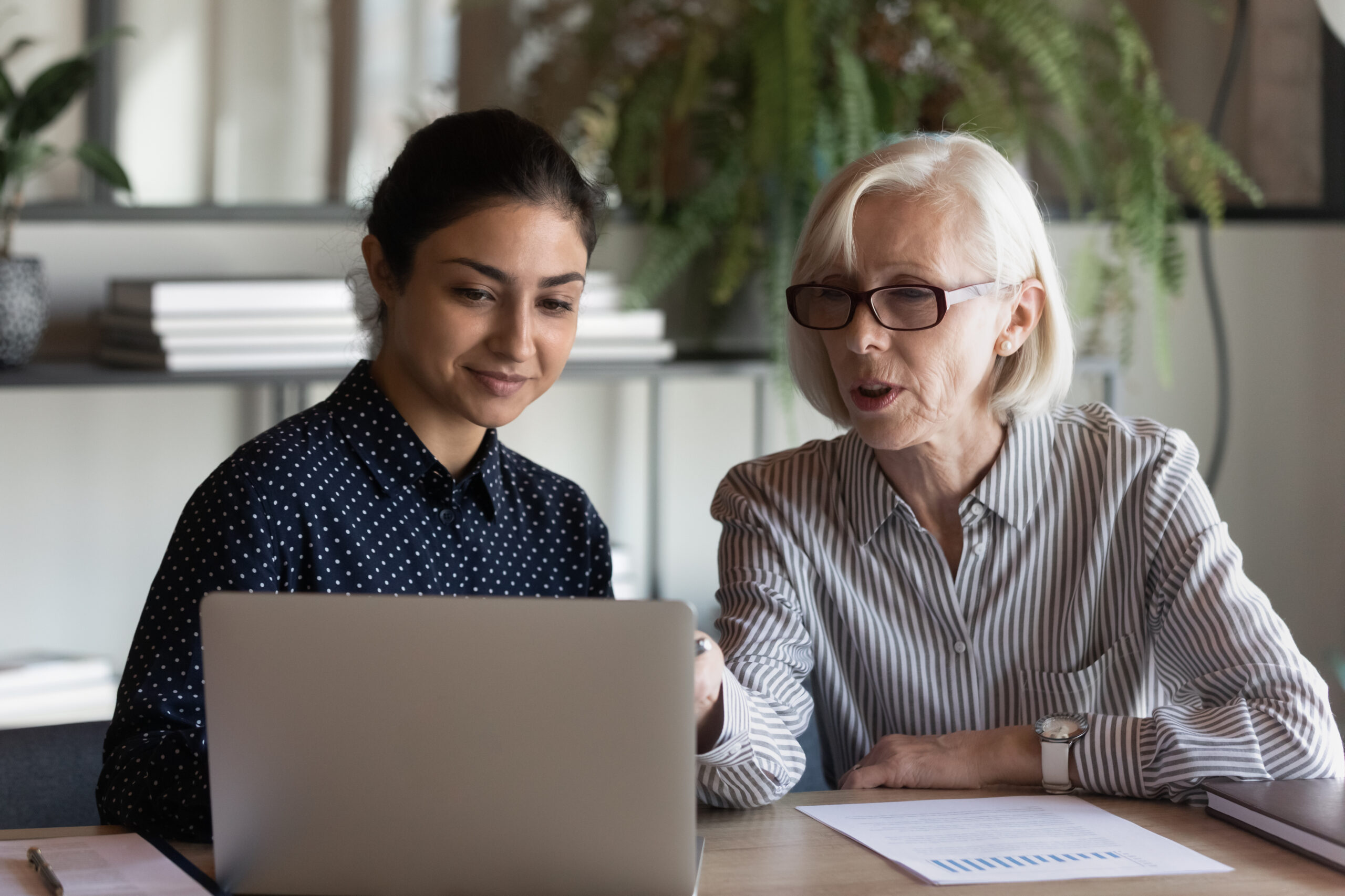 two women and a laptop