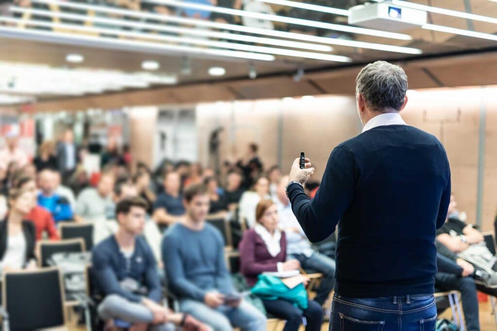 man teaching a class
